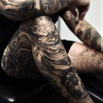 tatuaje pe picioare pentru bărbați